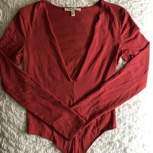 Deep V-neck bodysuit in Rust