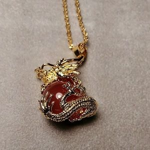 Gold Dragon necklace holding a rare red jade NWOT