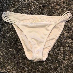 Two white vs bathing suit bottoms