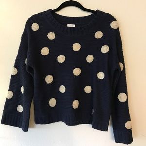 Polka dot sweater.
