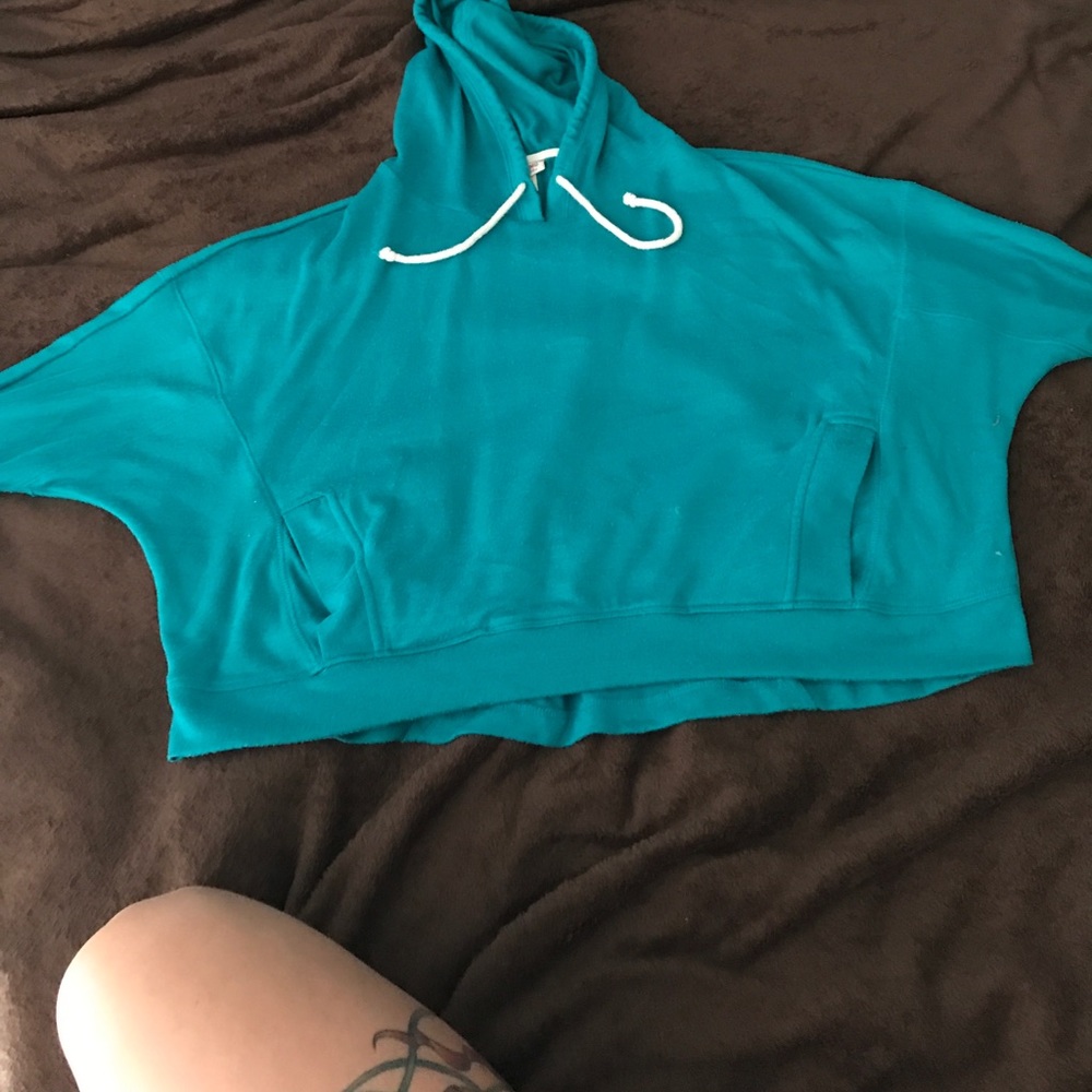 Turquoise crop hoodie.
