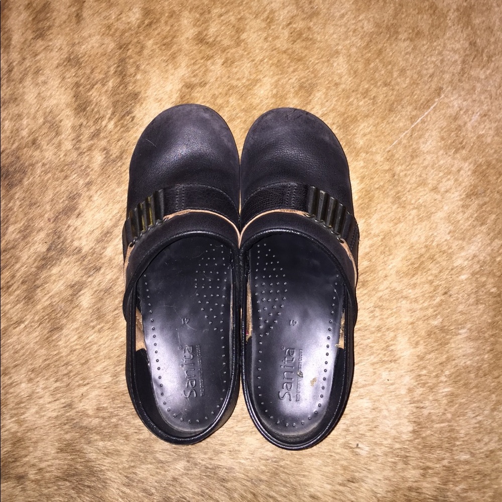Sanita black leather clogs