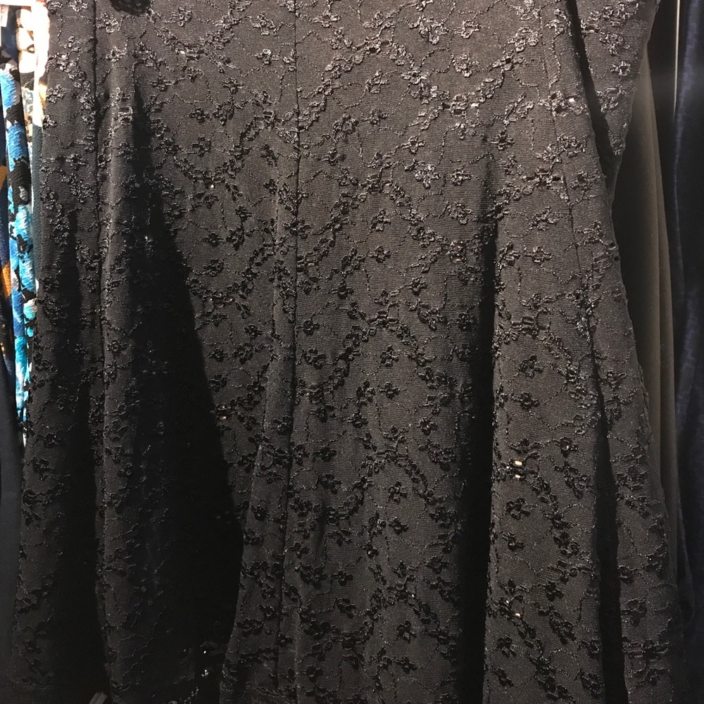 Black Cabi eyelet skirt size Large. Mid length.