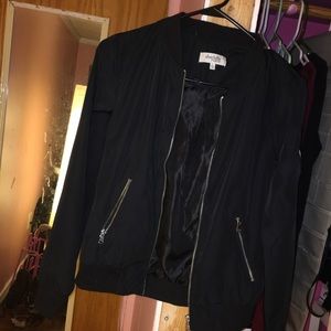 Bombers jacket with grey sweater crop top