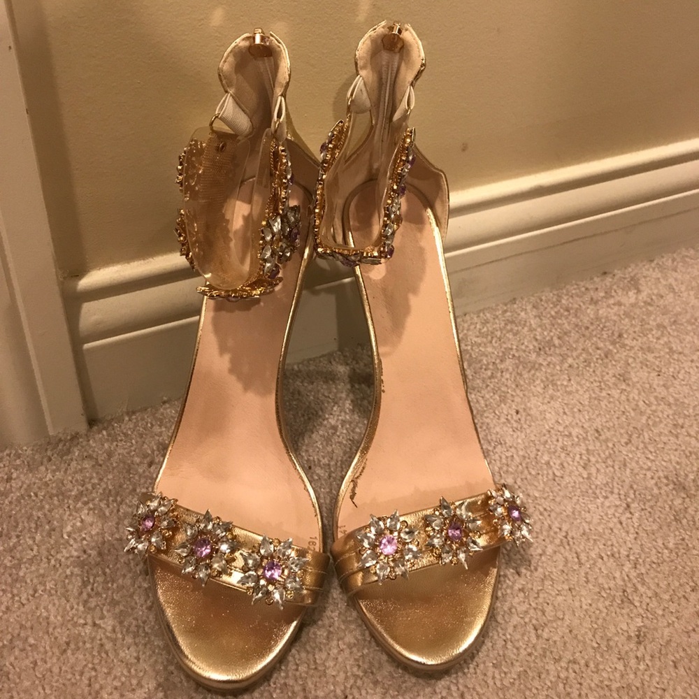 Metallic gold heels, with gems.