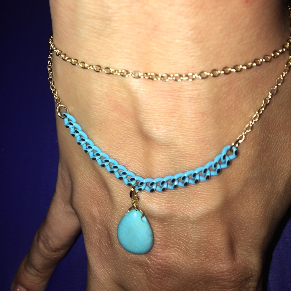 Gold double chain bracelet with turquoise crystal