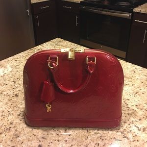SOLD!! Authentic alma rose Louis Vuitton