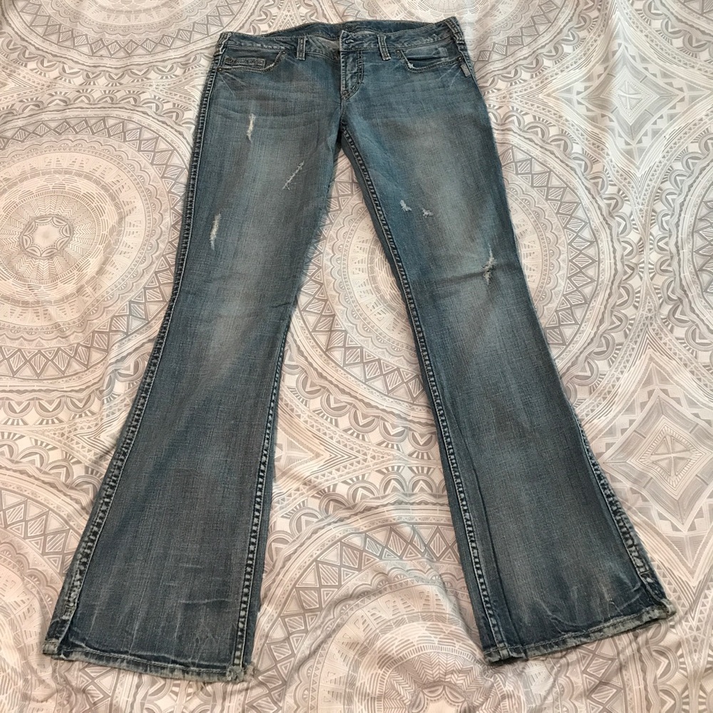 Silver "Twisted" Jeans.