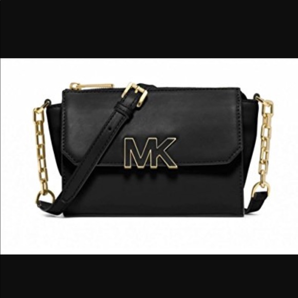 Michael Kors Handbags - Michael kors mini messenger. Price is negotiable