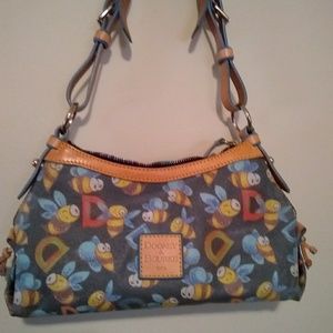 Dooney and Bourke "Ds and 🐝s" handbag.