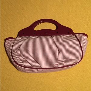 Striped hand bag in deep maroon and white
