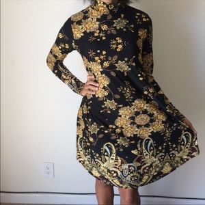 1 Cute fall patterned midi dress.