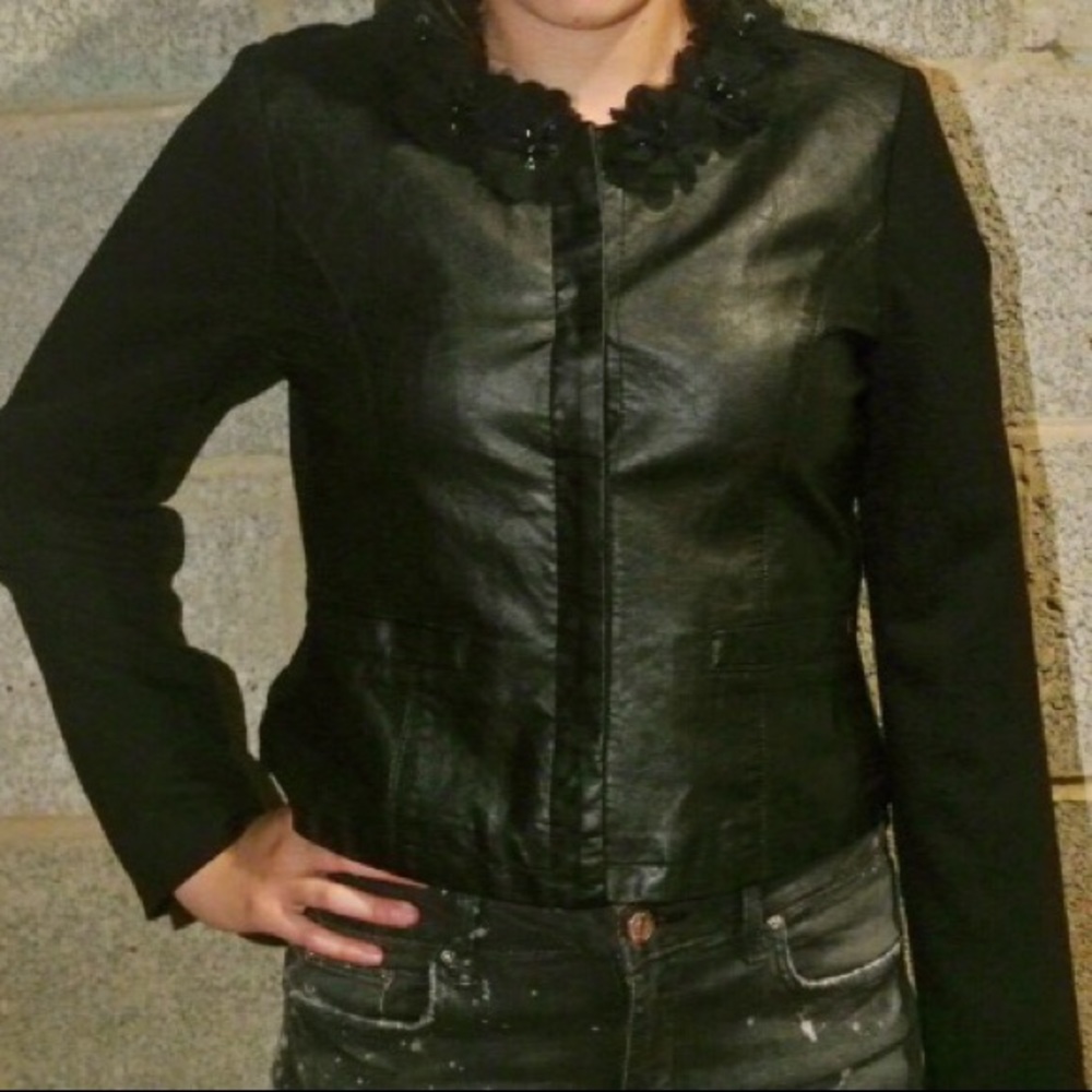 Leather jacket with floral neckline