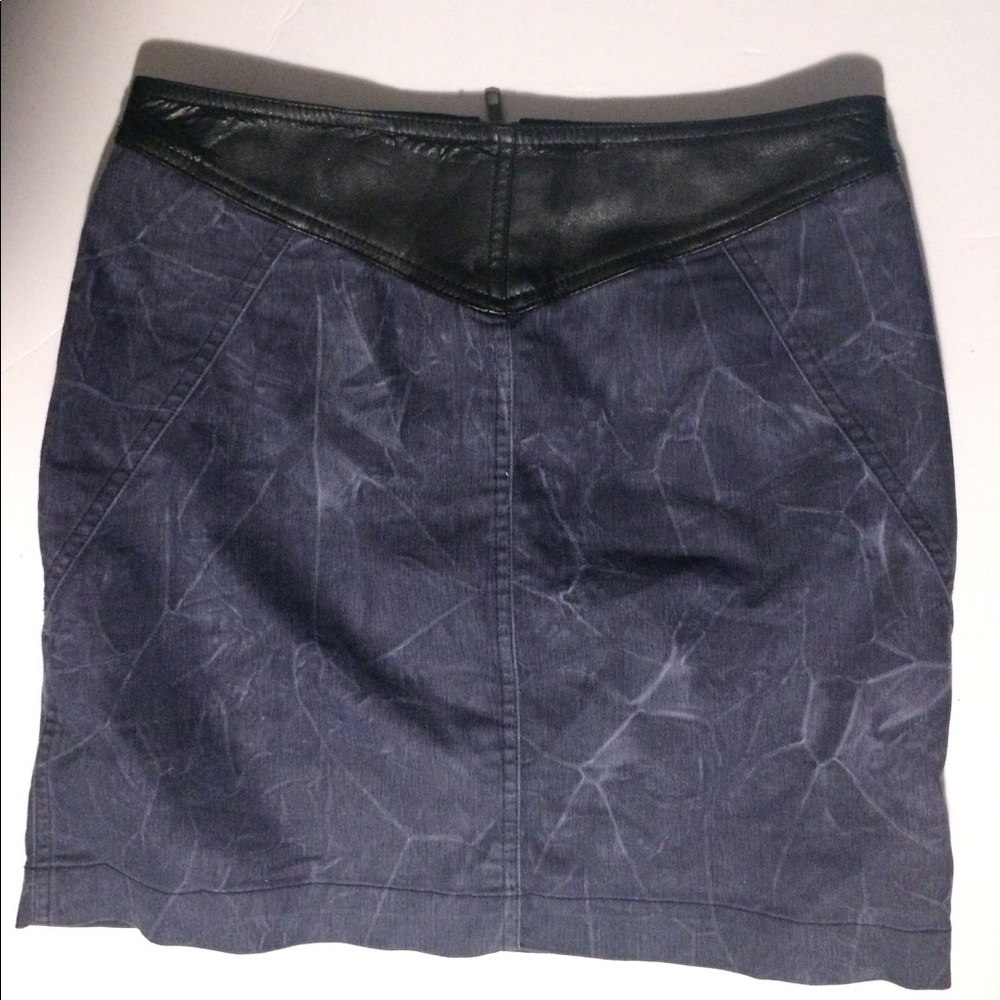 Faux leather accented denim miniskirt