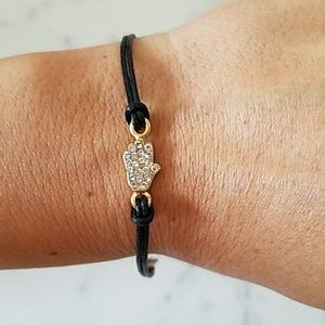Protecting hand leather bracelet in black