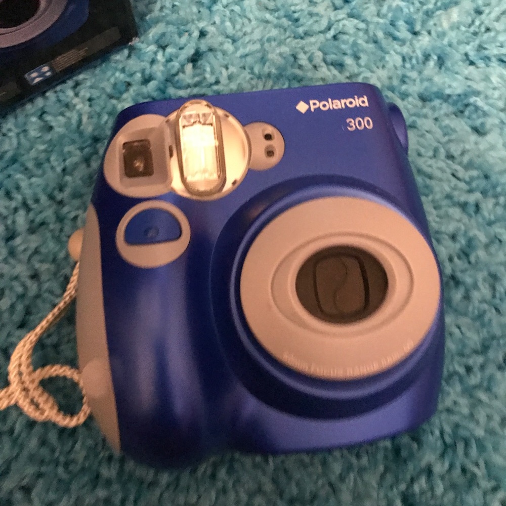 Polaroid 300 with pack of film