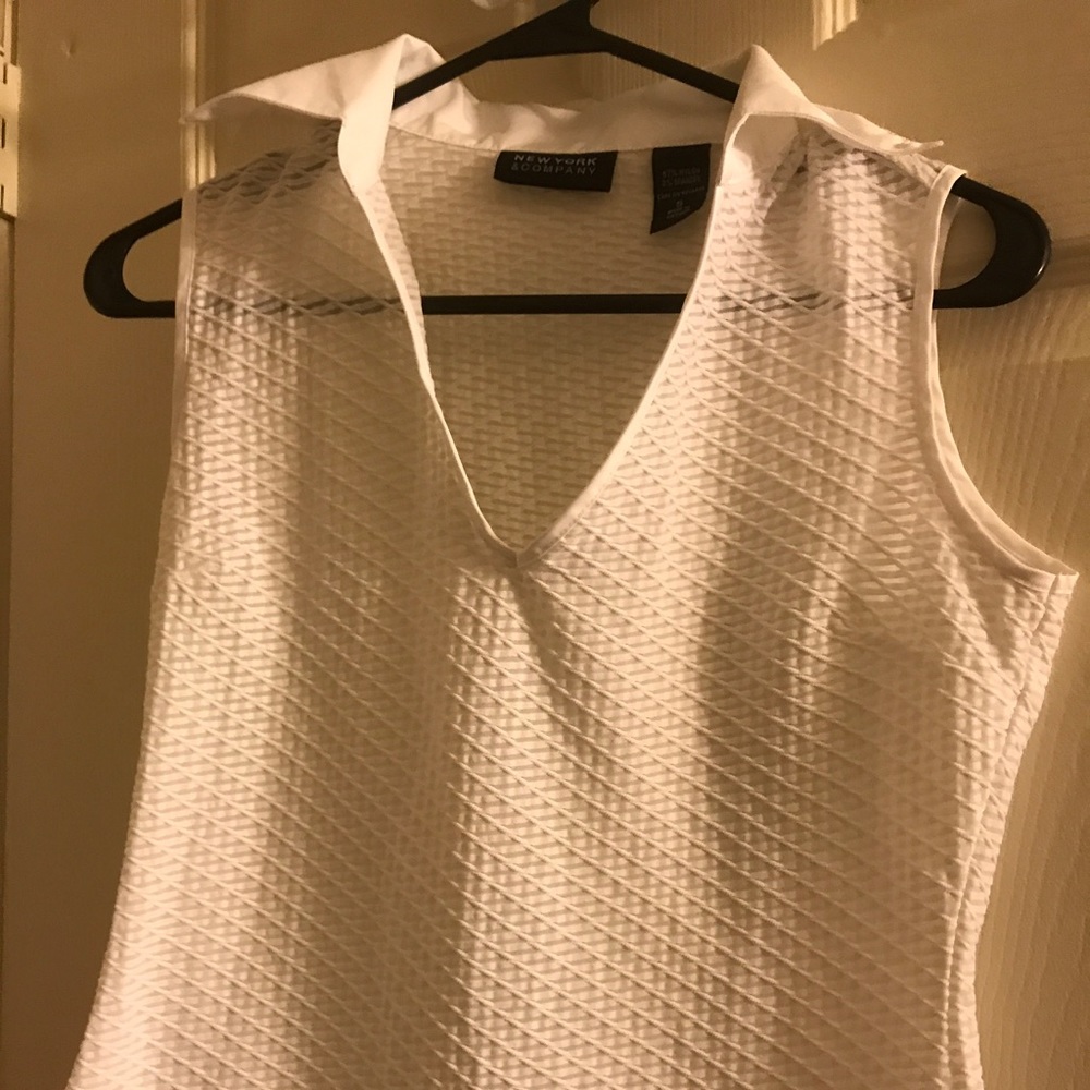 White sleeveless top