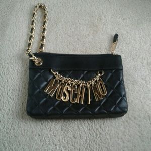 Moschino purse/ clutch/ wristlet