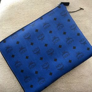 Like new MCM heritage blue clutch
