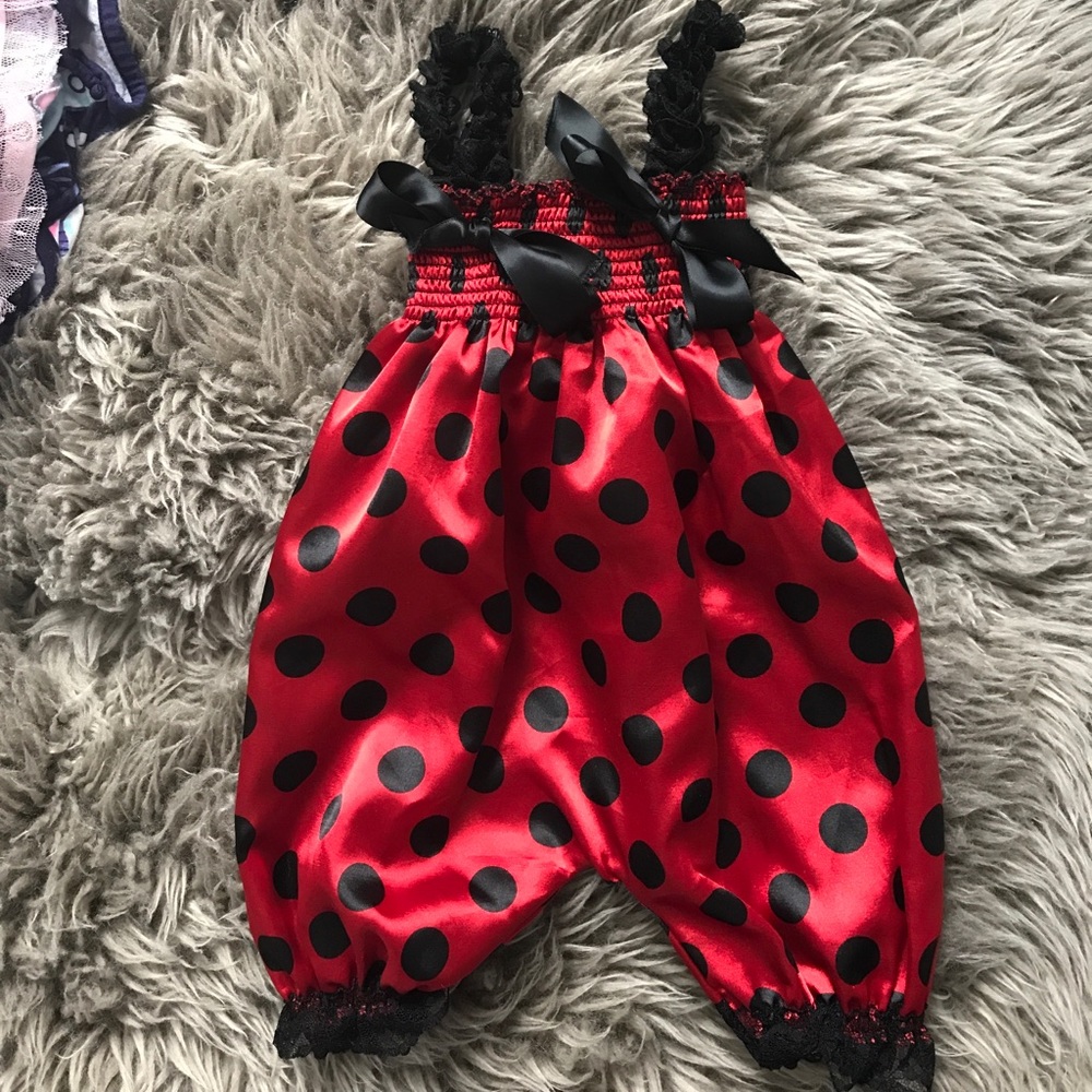 Red and black polka dot romper. Clown costume