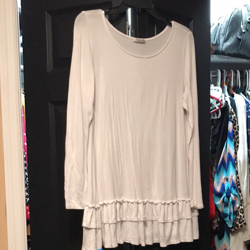 White ruffled top