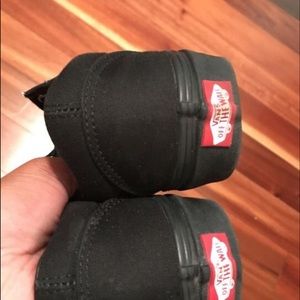 All black old skool vans