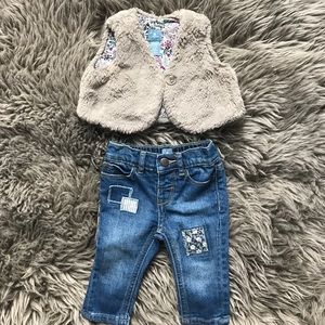 Fur vest and vintage jeans with patches