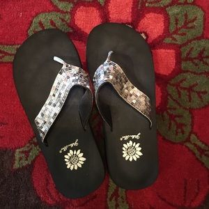 Yellow box flip flops