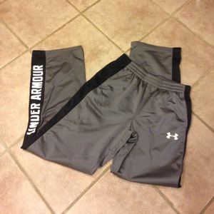 Under Armor youth athletic pants. Black and grey.