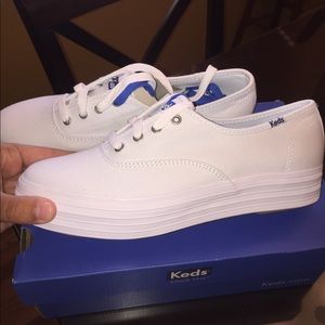 All white Ortholite Keds