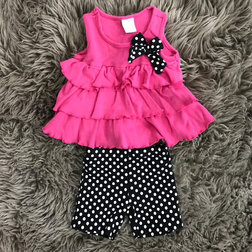 Hot pink ruffle and polka dot outfit. Size 6/9