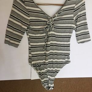 Black and white striped body suit