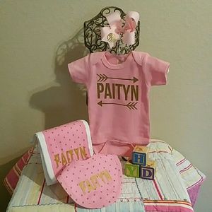 4-piece personalized baby shower gift.