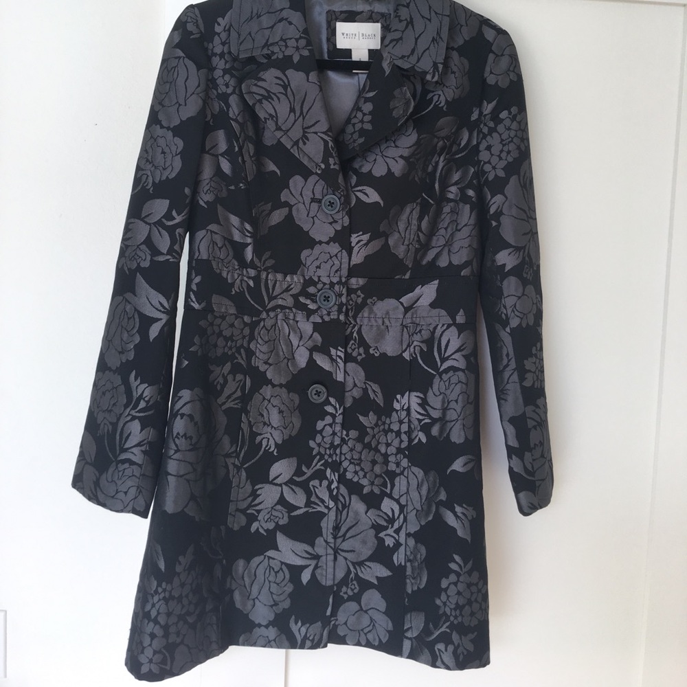 Black and grey blazer/jacket.