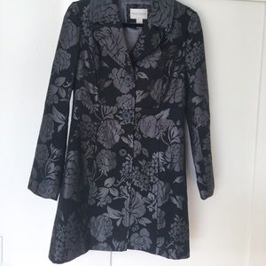 Black and grey blazer/jacket.