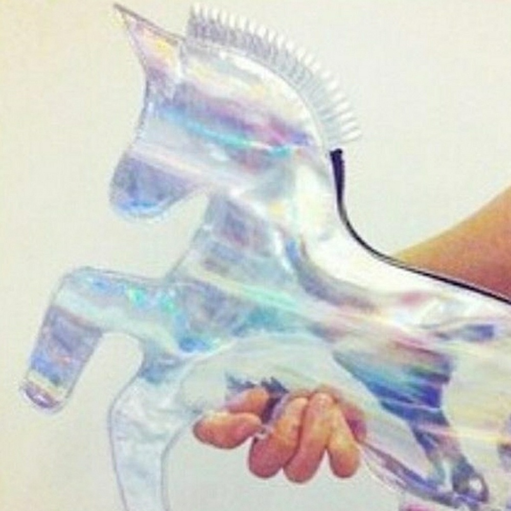 Unicorn clutch or cross-body purse.