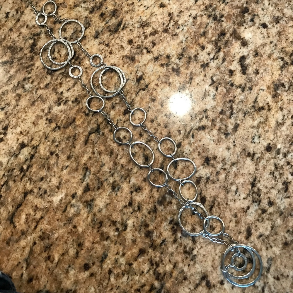Francesca's long silver necklace