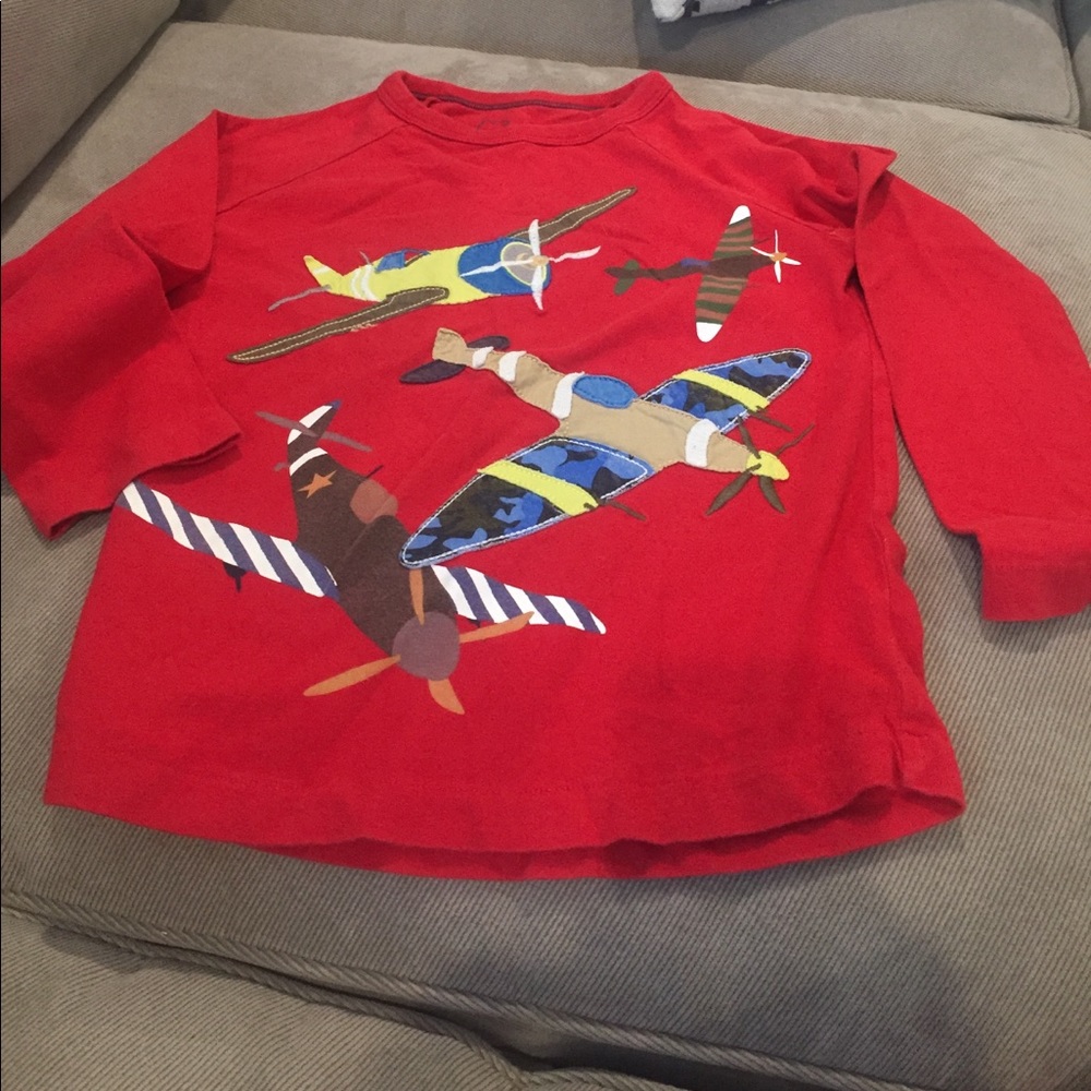 Red long sleeve shirt with planes