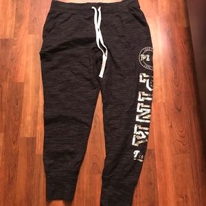 Pink sweats with silver writing