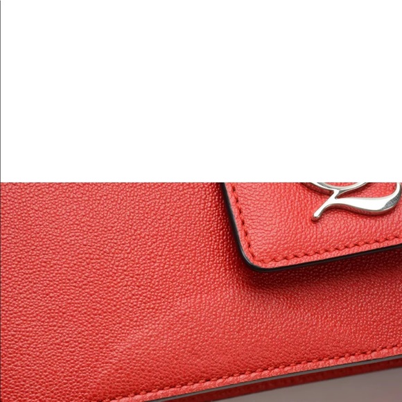 Small defect on bottom of bag. Leather  is raised - Picture 3 of 4