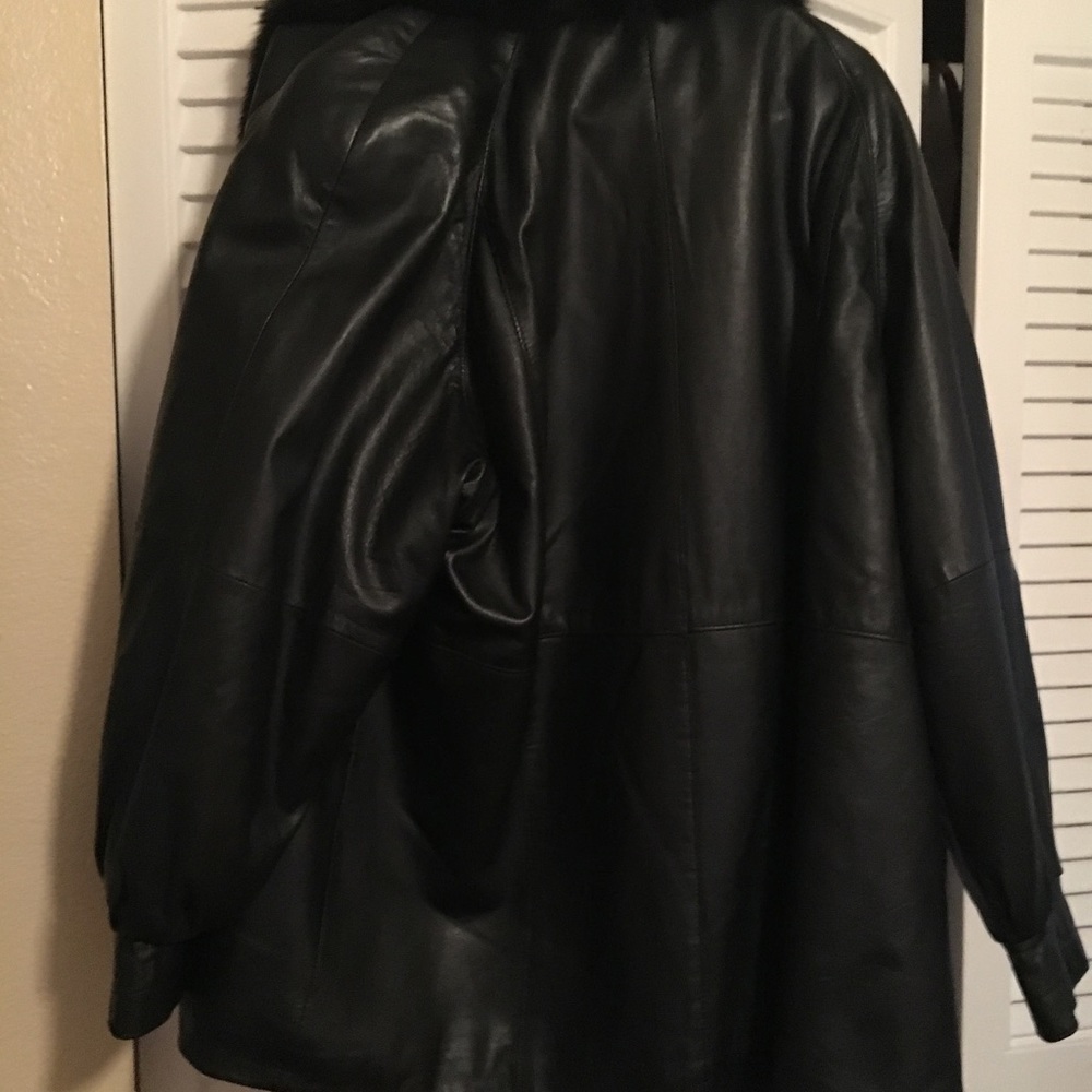 Leather jacket with faux fur collar