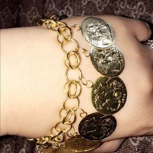 33.7grams of 21k real gold  coin charmed bracelet