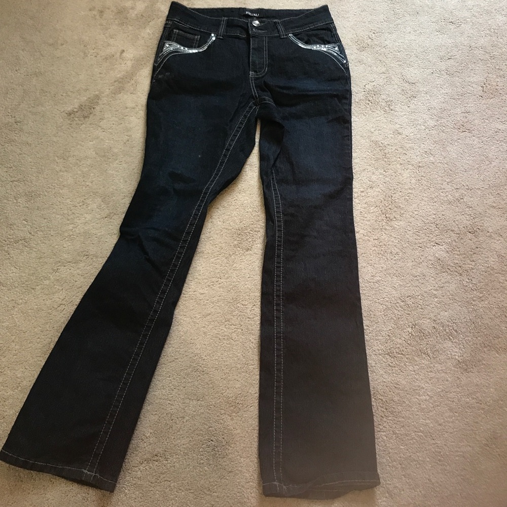 Dark stretchy jeans with detail