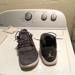 Gray and white Jordan eclipse shoes