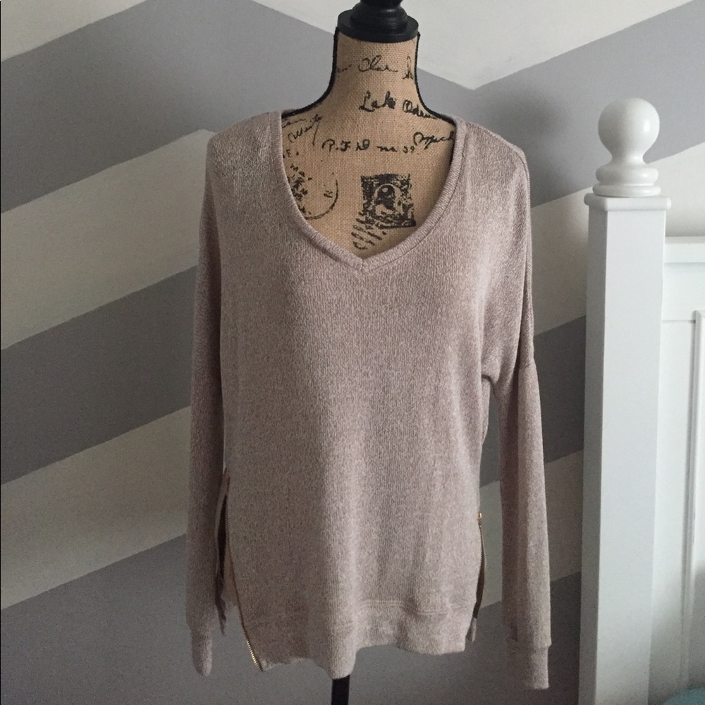 Brown sweater with gold zipper