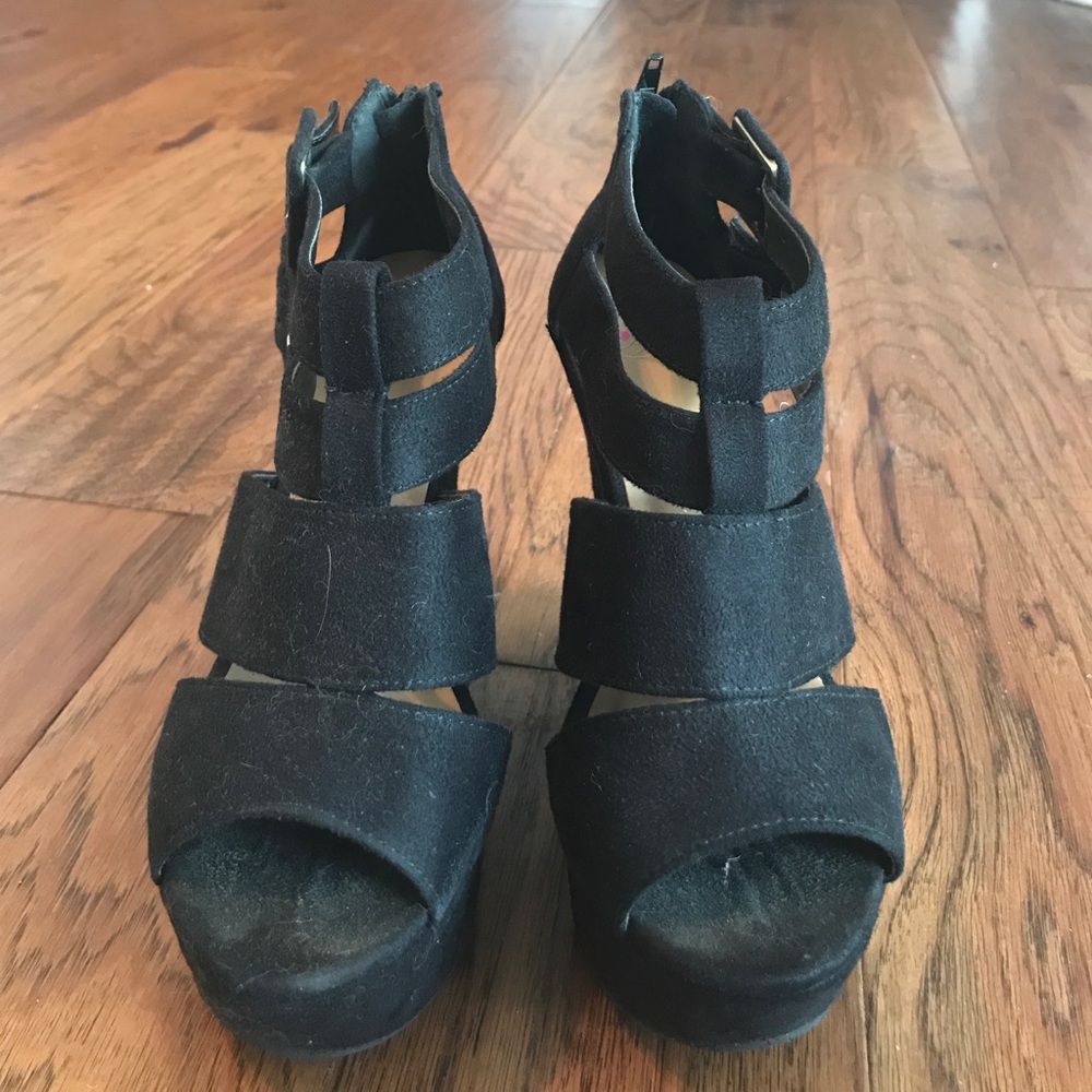 Caged black wedge heel