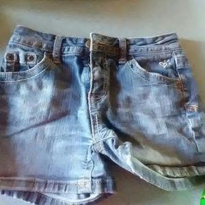 Girls jean shorts.  Look and feel brand new.