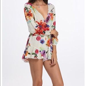 Chiffon floral print long sleeved romper.