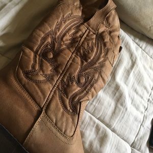 Tall brown cowboy boots