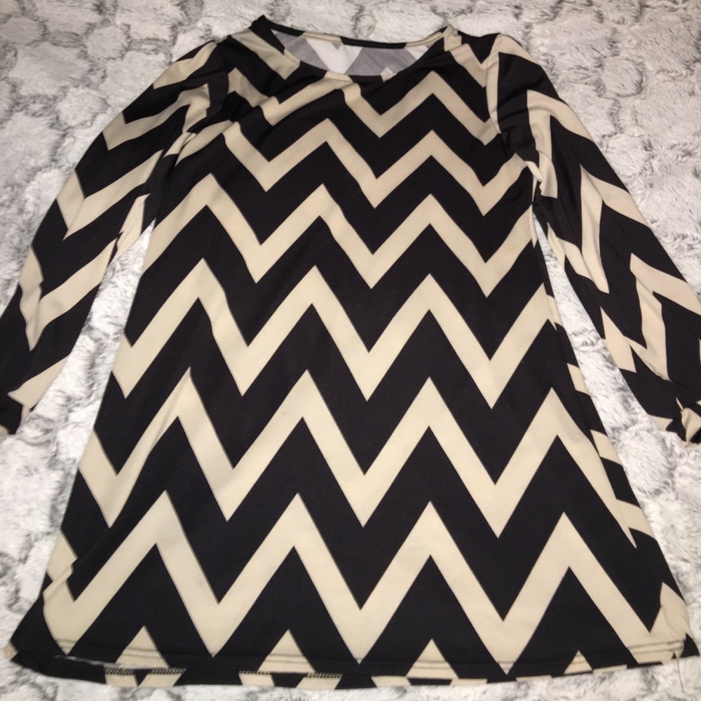 Black and beige long sleeve shirt